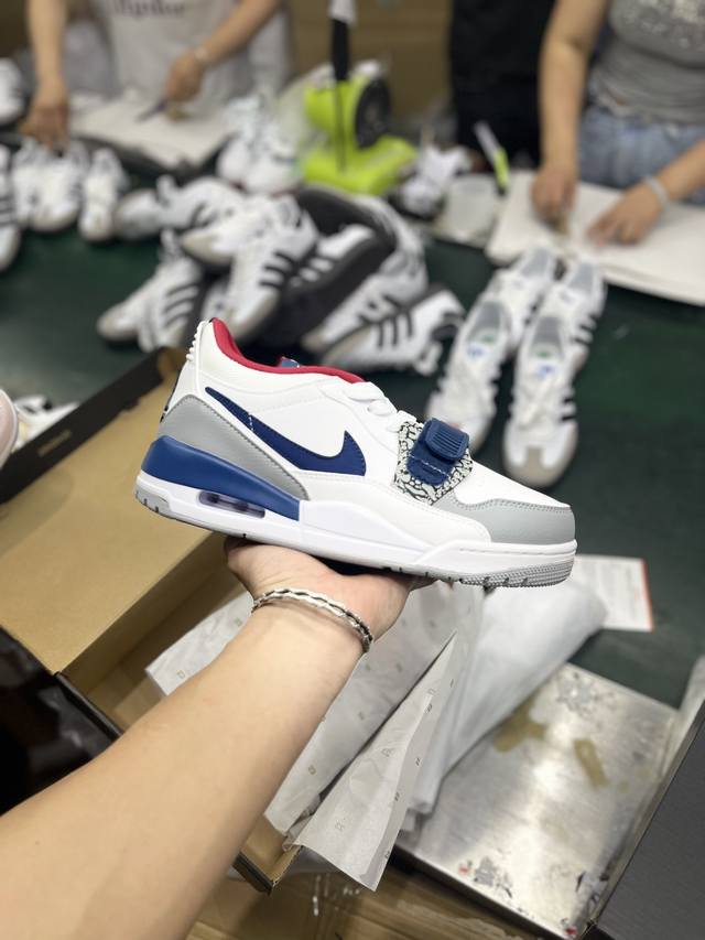 S版性价比 Air Jordan Legacy Aj312 低帮 鞋身采用了皮革材质打造 横跨鞋面的魔术贴十分吸睛 侧面的swoosh Logo的一部分被鞋面遮