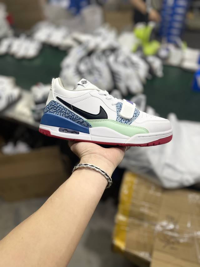 S版性价比 Air Jordan Legacy Aj312 低帮 鞋身采用了皮革材质打造 横跨鞋面的魔术贴十分吸睛 侧面的swoosh Logo的一部分被鞋面遮