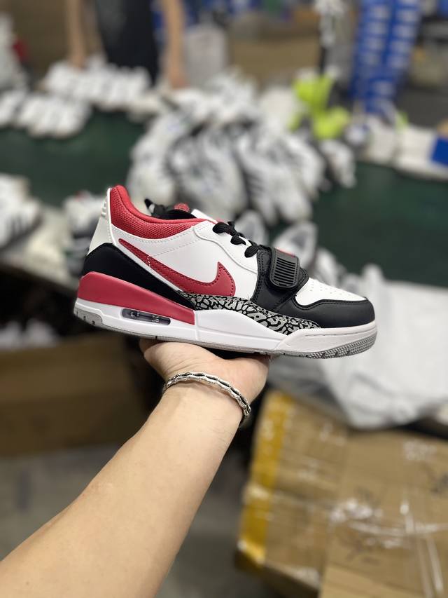 S版性价比 Air Jordan Legacy Aj312 低帮 鞋身采用了皮革材质打造 横跨鞋面的魔术贴十分吸睛 侧面的swoosh Logo的一部分被鞋遮挡