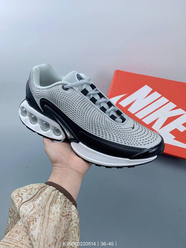 全新nike Air Max Dn 运动鞋 时尚跑步鞋，豆荚造型气垫吸睛！鞋面采用织物材质打造，提供舒适的穿着体验。这款鞋不仅具有时尚的外观，还融合了许多经典的