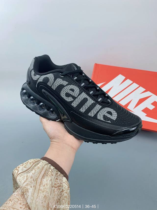 全新nike Air Max Dn 运动鞋 时尚跑步鞋，豆荚造型气垫吸睛！鞋面采用织物材质打造，提供舒适的穿着体验。这款鞋不仅具有时尚的外观，还融合了许多经典的