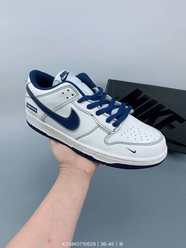 Supreme X Nike Dunk Sb Low 耐克 Sb 低帮 联名白黑 鞋身以白色作为主色调，使鞋款十分百搭，同时swoosh Logo的装饰贴片使用