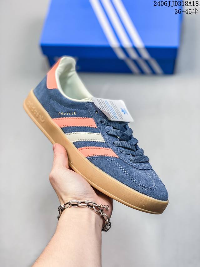 阿迪达斯 Adidas Handball Spezial 三叶草学院风复古休闲板鞋 德训鞋 橡胶底柔软皮革经典运动鞋板鞋。圆头、缝合拼接设计、正面绑带、鞋舌部位