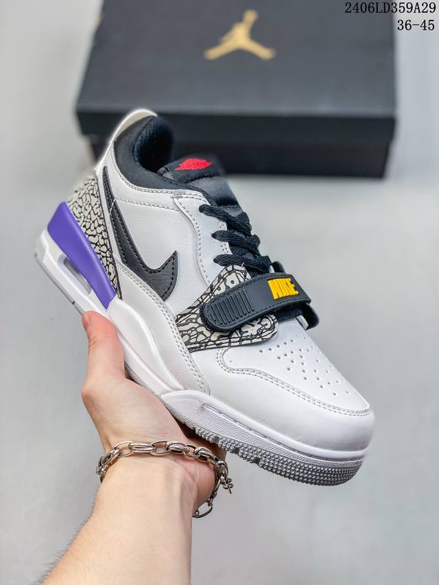 Air Jordan Legacy 312头层皮打造市面最强工艺有着交错结合的设计，它的名字就展现出它所包含的鞋款元素，312 分别对应了 Air Jordan