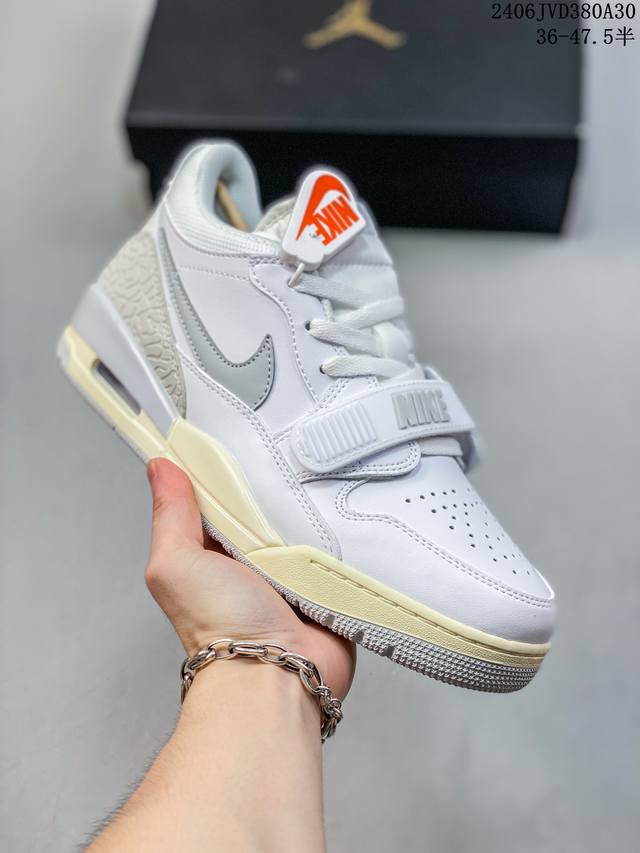 Air Jordan Legacy 312头层皮打造市面最强工艺有着交错结合的设计，它的名字就展现出它所包含的鞋款元素，312 分别对应了 Air Jordan