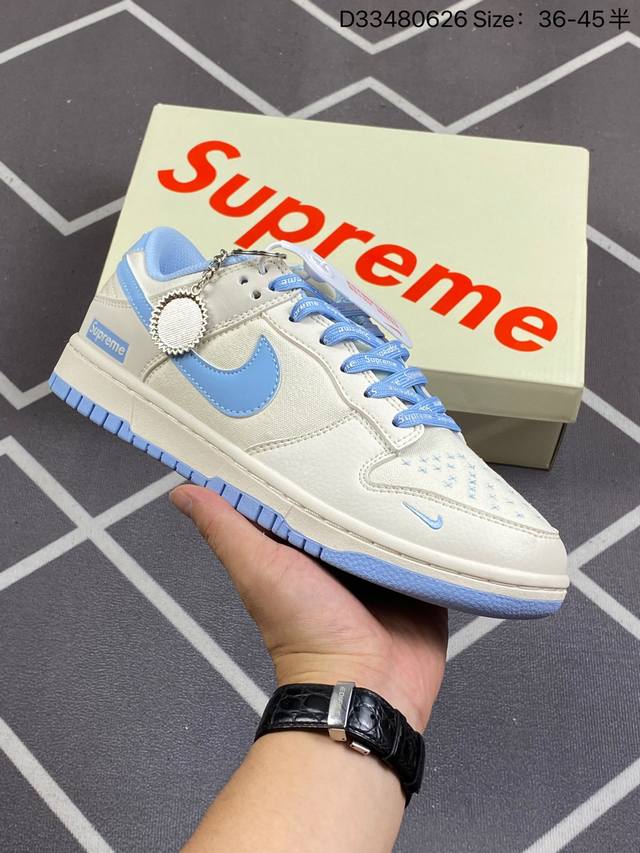 Supreme X Nike Dunk Low 运动滑板鞋，此款主张打破传统的工业化流水线设计限制，以made By Ideas的超级创意为理念，集结众多潮流设