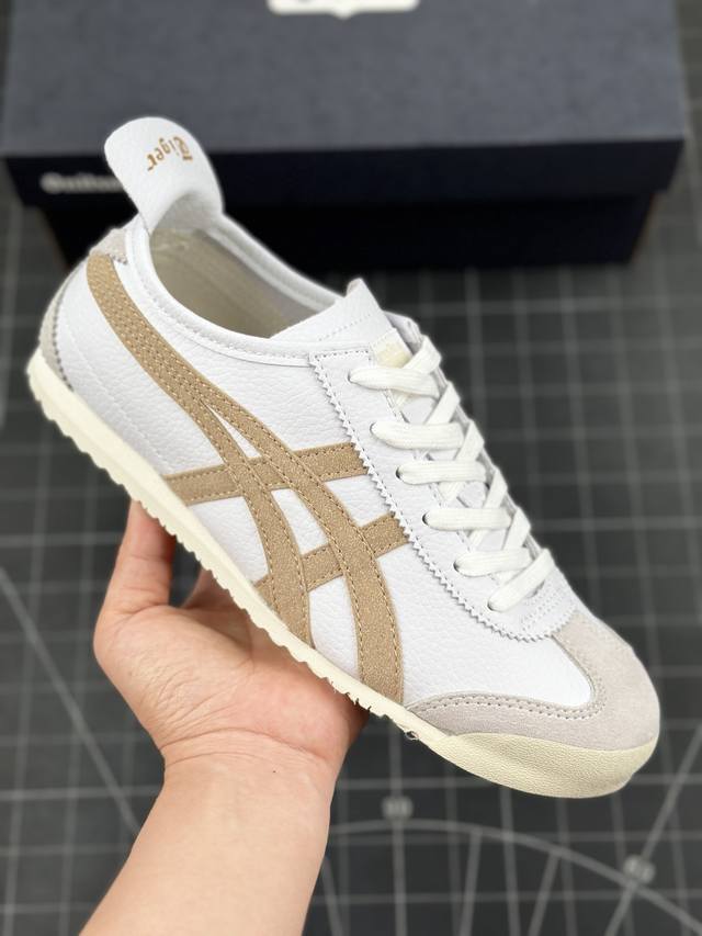 Onitsuka Tiger Mexico66 鬼冢虎低帮 白棕 男女同款 减震支撑低帮运动休闲鞋 这款鞋由皮革制成，具有鞋跟交叉加固设计，可提供更高的稳定性和