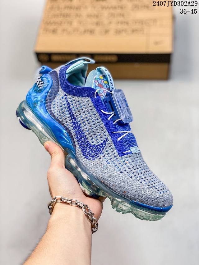 nk Air Vapormax Flyknit 全新飞织快速系带全掌大气垫百搭休闲运动慢跑鞋 Cj6740-400#鞋面以多种颜色呈现，搭配格纹装饰，同时鞋身还