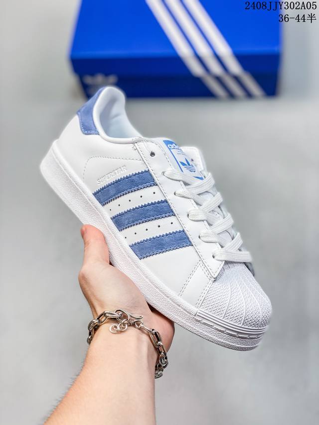 阿迪达斯 Adidas Superstar 三叶草经典贝壳头系列 新款休闲板鞋潮流男女士运动鞋 鞋面柔软皮革材质 标志性的贝壳鞋头，锯齿三条纹，简约的线条。就连