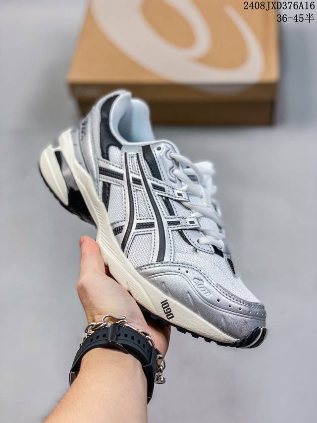 anderssonbell X Asics Gel- 0 亚瑟士联名款复古绑带机能跑鞋 鞋身设计选用优质材料制成鞋面 为其增添舒适脚感 中底采用了更为柔软的材料