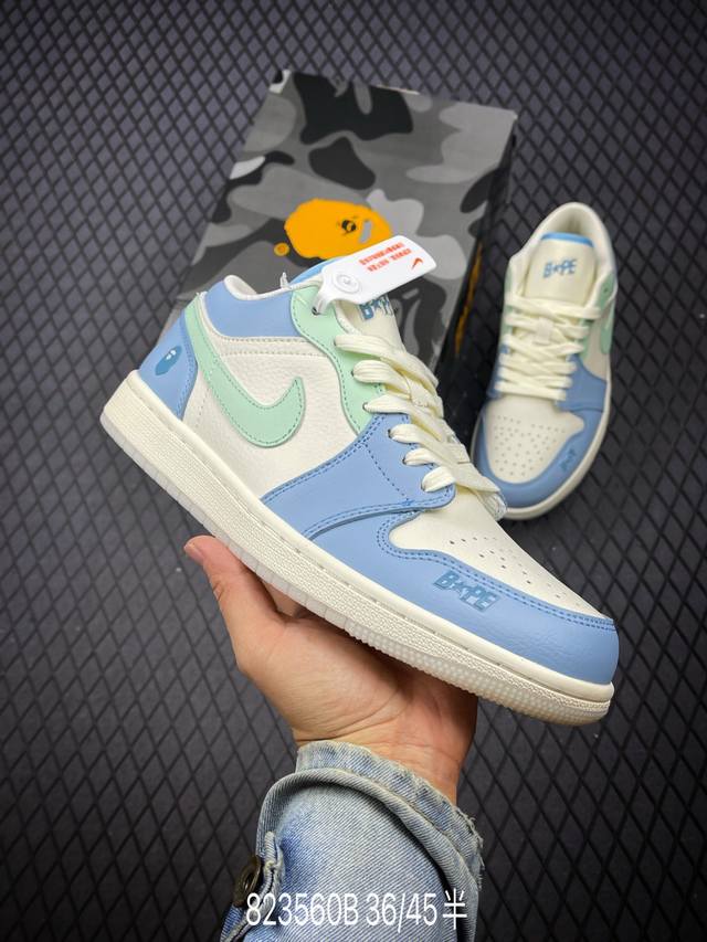 Bape X Air Jordan 1 Low 天青蓝 此款主张打破传统的工业化流水线设计限制，以made By Ideas的超级创意为理念，集结众多潮流设计师