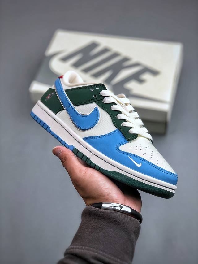 Nike SB Dunk Low 巴黎奥运限定-蓝绿拼接 高端定制 低帮休闲板鞋 #吉祥物形象是基于法国传统弗里吉亚帽拟人化设计的，灵感来源于蓝精灵 动画片中蓝