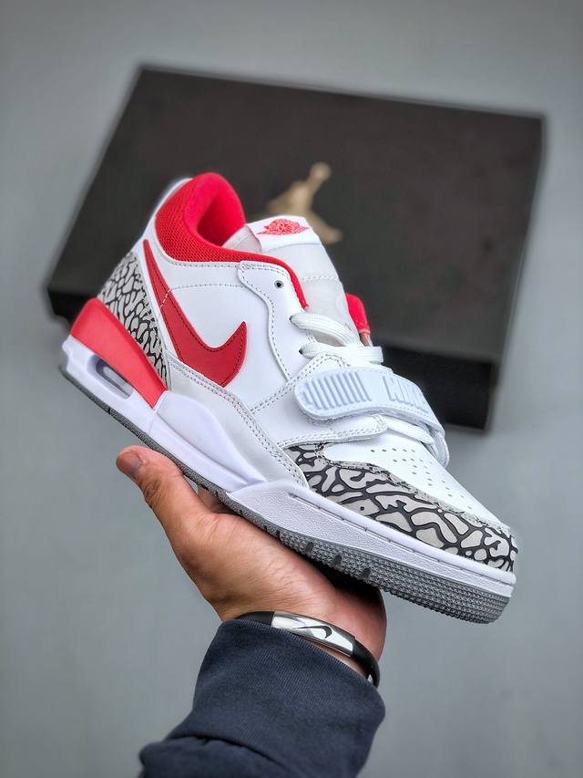 Nike Air Jordan Legacy 312 水泥白红 官方货号：FQ7827 106 有着交错结合的设计，它的名字就展现出它所包含的鞋款元素，312