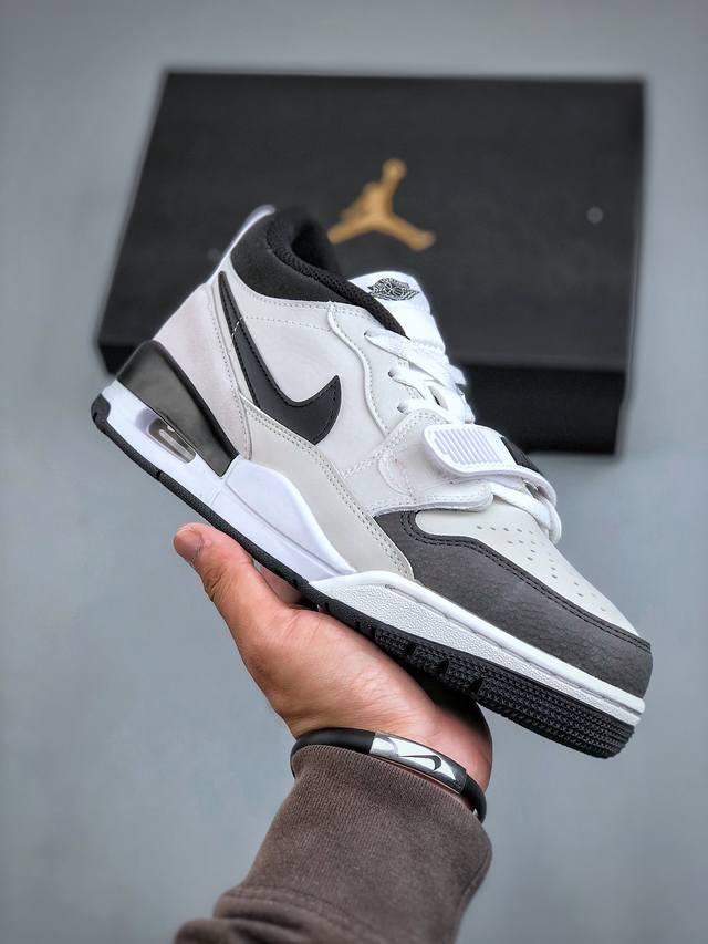 Jordan Legacy 312 Low 白黑 鞋身采用了皮革材质打造 横跨鞋面的魔术贴十分吸睛 侧面的swoosh Logo的一部分被鞋面遮挡了一部分 颇具