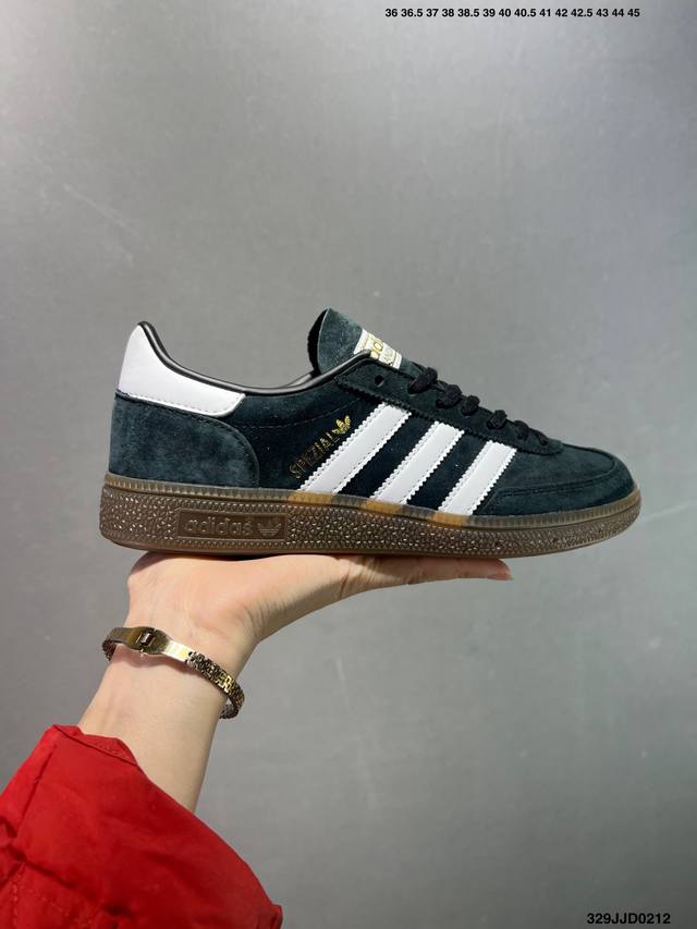 Adidas Originals Handball Special 褐色 此款鞋延续了橡胶外底和经典款式的传统。优质绒面革鞋面和标志性的3条纹采用明亮的对比色，